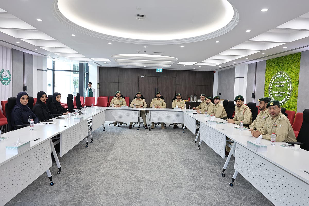 Dubai Police officers discuss future-ready security solutions for desert communities