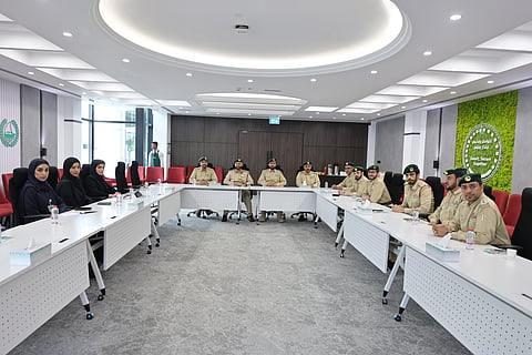 Dubai Police officers discuss future-ready security solutions for desert communities