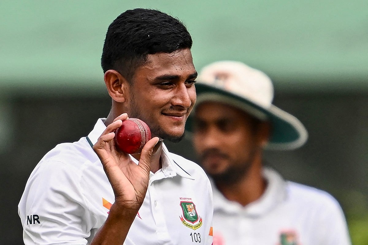 Bangladesh's Nahid Rana acknowledges the crowd after taking a five-wicket haul after his team's win.
