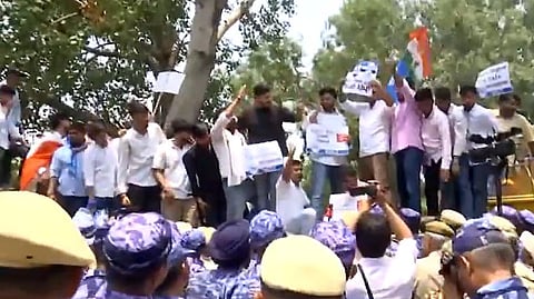 The National Students' Union of India activists protest outside Shastri Bhawan in New Delhi against the National Testing Agency (NTA) after the cancellation of the NEET UG 2026 examination.