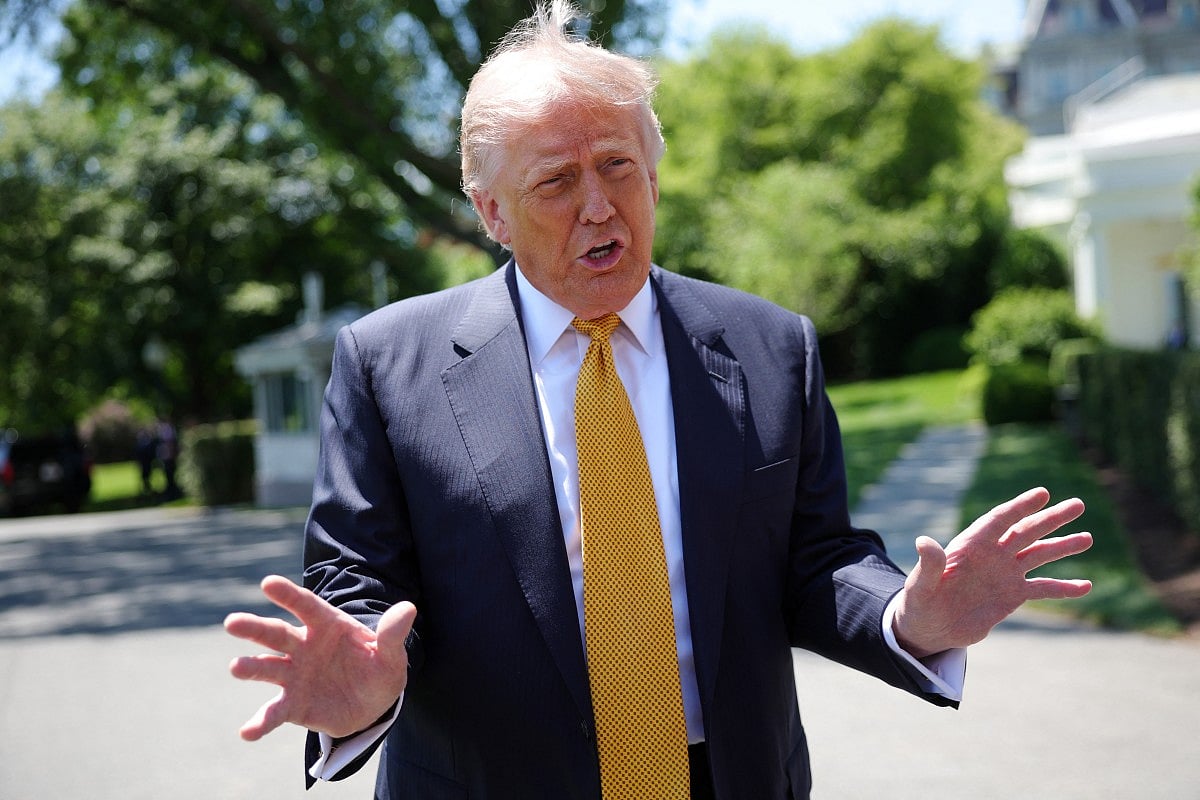 President Donald Trump speaks to the press as he departs the White House on May 12, 2026 in Washington, DC. Trump is traveling to China where he is scheduled to meet with Chinese President Xi Jinping for expected talks on the Iran conflict, trade imbalances, regional security, and economic cooperation between the two countries.