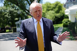 President Donald Trump speaks to the press as he departs the White House on May 12, 2026 in Washington, DC. Trump is traveling to China where he is scheduled to meet with Chinese President Xi Jinping for expected talks on the Iran conflict, trade imbalances, regional security, and economic cooperation between the two countries.