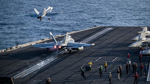 US fighter jets operate from an aircraft carrier. Despite its overwhelming military superiority, Washington faces the challenge of preventing Iran from rebuilding enough capability to prolong the war.