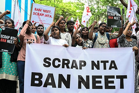 Members of the Students' Federation of India protest against the National Testing Agency (NTA) after the cancellation of the NEET examination over an alleged paper leak, in Chennai on May 14. Photo used for illustrative purposes. 