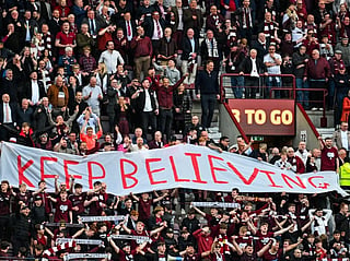 Hearts fans react after the final whistle in the Scottish Premiership football match between Hearts and Rangers at Tynecastle Stadium 
