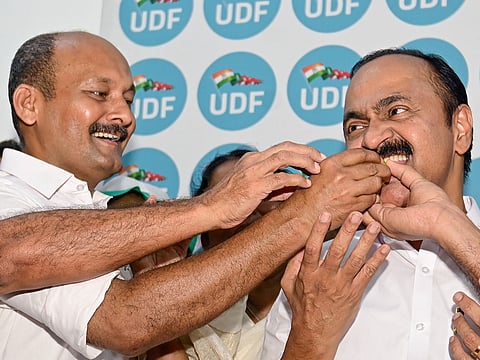 Thiruvananthapuram: Congress leader V.D. Satheesan being offered sweets by supporters at his official residence after being named the new Chief Minister of Kerala in Thiruvananthapuram on Thursday, May 14, 2026. 