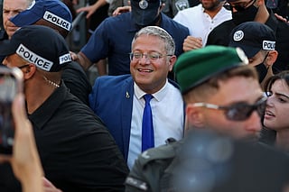 Israel's National Security Minister Itamar Ben Gvir (C) takes part in the Jerusalem Day parade at the Damascus Gate in the old city of Jerusalem on May 14, 2026.