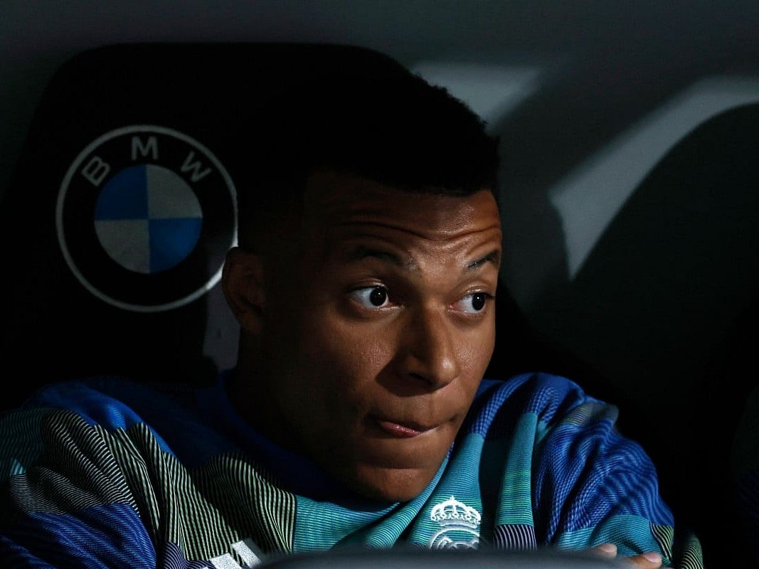 Real Madrid's French forward #10 Kylian Mbappe is pictured in the bench before the Spanish league football match between Real Madrid CF and Real Oviedo at Santiago Bernabeu Stadium in Madrid on May 14, 2026.