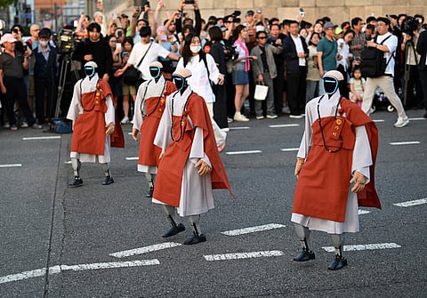 Robot monks stride out for Lotus Lantern Festival parade in Seoul