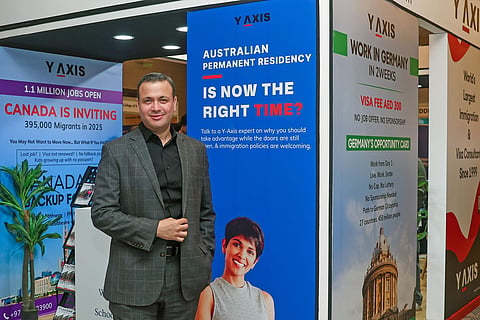Clint Khan, Director, Y-Axis