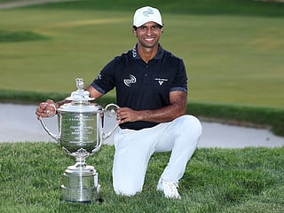 Aaron Rai of England celebrates with The Wanamaker Trophy after victo during the final round of the PGA Championship at Aronimink Golf Club 