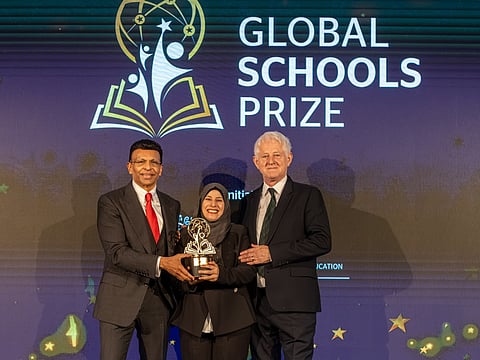From left: Sunny Varkey, Kadria Hussein and Richard Curtis at the award ceremony in London on Tuesday.