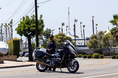 A San Diego Police officer blocks the road to the Islamic Center of San Diego following a shooting in southern California, on May 18, 2026.  