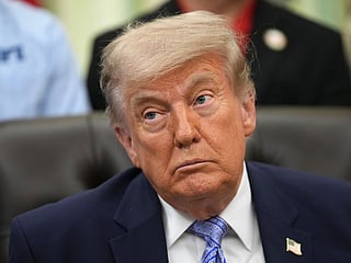 President Donald Trump attends an event about loosening a federal refrigerant rule, in the Oval Office at the White House, Thursday, May 21, 2026, in Washington. (AP Photo/Jacquelyn Martin)