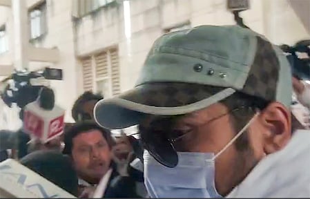 Police take Twisha Sharma's husband into custody after he appears in Jabalpur court.
