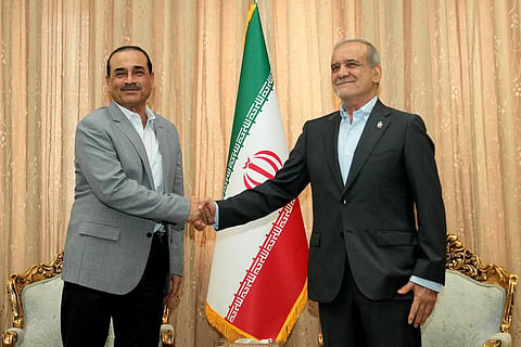 Iran's President Masoud Pezeshkian (right) during his meeting with Pakistan’s Defence Forces Chief Field Marshal Asim Munir in Tehran on May 23, 2026.