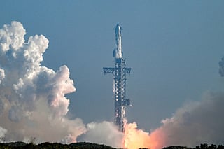 SpaceX's Starship 39 rocket launches from Starbase during the 12th test flight as seen from South Padre Island, Texas, on May 22, 2026.