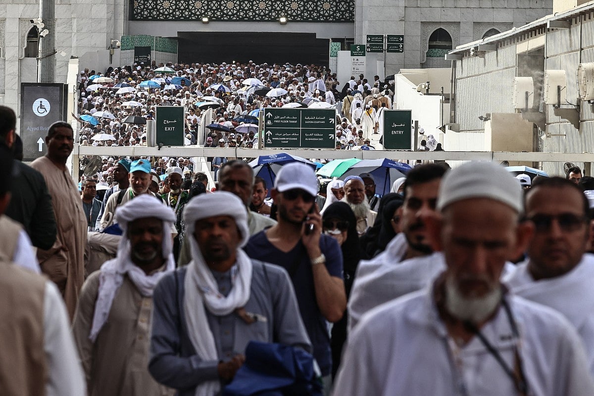 Muslim worshippers leave the Grand Mosque complex after offering prayers in the holy city of Mecca on May 24, 2026, ahead of the annual Hajj pilgrimage.