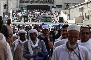 Muslim worshippers leave the Grand Mosque complex after offering prayers in the holy city of Mecca on May 24, 2026, ahead of the annual Hajj pilgrimage.