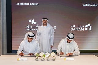 Yousif Al Mutawa and Dr Sulaiman Tareq Al Abduljader during the agreement signing ceremony in the presence of Ahmed Obaid Al Qaseer, CEO of Shurooq.