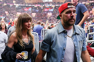 Singer Taylor Swift and Travis Kelce of the Kansas City Chiefs attend Game Three between the New York Knicks and the Cleveland Cavaliers in the NBA Eastern Conference Finals at Rocket Arena on May 23, 2026 in Cleveland, Ohio.