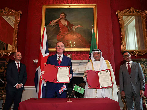 UK's Minister of State for Trade Chris Bryant (centre L) and Jasem Mohamed Albudaiwi (centre R), secretary general of the Gulf Cooperation Council, after a signing ceremony at Downing Street in London on May 20, 2026.  