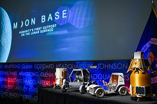Models of lunar rovers and landers are displayed during a news conference at NASA headquarters in Washington, DC, on May 26, 2026, to outline plans for NASA's "Moon Base" lunar base and progress toward a sustained human presence on the Moon.