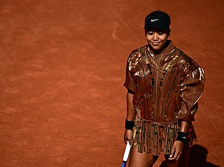 Japan's Naomi Osaka warms up prior to her women's singles match against Croatia's Donna Vekic on day 5 of the French Open tennis tournament on Court Simonne-Mathieu at the Roland-Garros Complex in Paris on May 28, 2026.