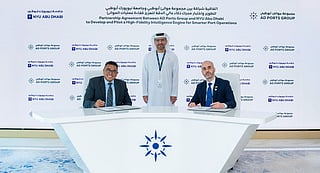 Arlie Peters, Provost - NYU Abu Dhabi and Mohamed Jamal-Eddine, Group Chief Digital and Information Officer at AD Ports Group, with Captain Mohamed Juma Al Shamisi, Group CEO and Managing Director of AD Ports Group. 