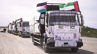 Four convoys carrying food and 540 tonnes of Eid clothing reach Gaza before Eid.