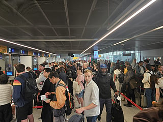 Passengers queue at immigration counters at Warsaw International Airport amid ongoing disruption linked to the EU’s new Entry/Exit System (EES), which has triggered long delays at several European airports.