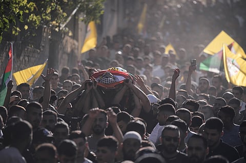 Palestinian man shot, killed at a West Bank barrier near Jerusalem