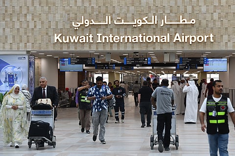 Kuwait halted flights and activated emergency plans after an Iranian missile and drone strike hit the country's airport terminal 1.