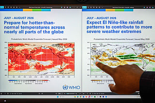 Head of climate prediction services at the World Meteorological Organization (WMO) Wilfran Moufouma-Okia points on graphs displayed on a computer screen at the WMO headquarters in Geneva, on June 1, 2026. 