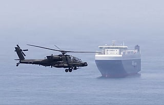 A US Apache attack helicopter flying over the Gulf. At the centre of the US-Iran dispute are two issues that negotiators have struggled to resolve for months: Iran’s stockpile of highly-enriched uranium and the future status of the Strait of Hormuz.
