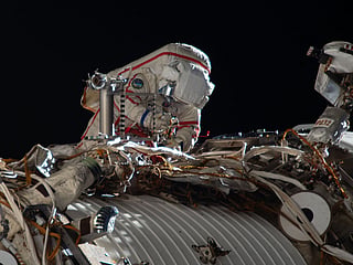 ISS crew briefly shelters in Dragon capsule as Russian team checks leak repairs