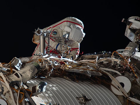 ISS crew briefly shelters in Dragon capsule as Russian team checks leak repairs