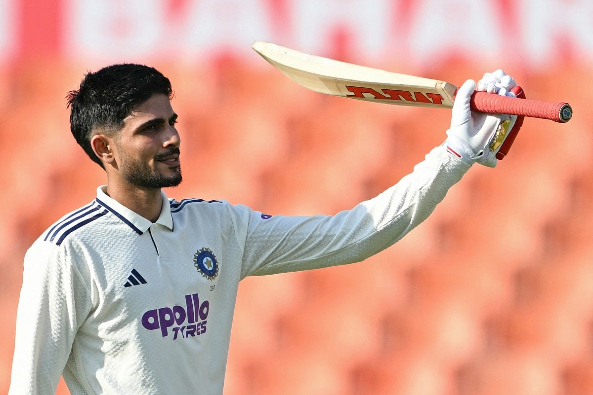 India's captain Shubman Gill celebrates after scoring a century (100 runs) during the first day of the only Test cricket match between India and Afghanistan at the Maharaja Yadavindra Singh International Cricket Stadium on the outskirts of Chandigarh on June 6, 2026.
