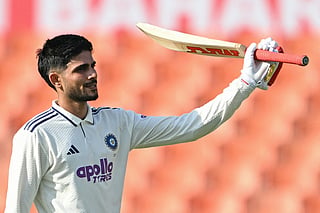 India's captain Shubman Gill celebrates after scoring a century (100 runs) during the first day of the only Test cricket match between India and Afghanistan at the Maharaja Yadavindra Singh International Cricket Stadium on the outskirts of Chandigarh on June 6, 2026.