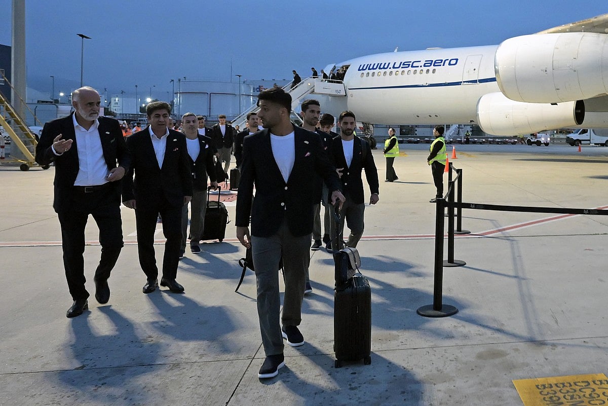 Iran's players walk on the tarmac on arrival at the Tijuana International Airport in Tijuana, Mexico on June 7, 2026, ahead of the FIFA 2026 World Cup football tournament.