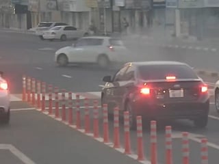 Sharjah Police footage shows a vehicle moments before a serious crash at an intersection. 