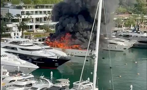 Flames engulf the luxury vessel while berthed at ONE°15 Marina Sentosa Cove in Singapore on Jun 7, 2026.