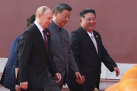 FILE - In this photo provided by the North Korean government, Russian President Vladimir Putin, from left, Chinese President Xi Jinping and North Korean leader Kim Jong Un walk to attend a military parade marking the 80th anniversary of the end of World War II at the Tiananmen Square in Beijing Wednesday, Sept. 3, 2025. Independent journalists were not given access to cover the event depicted in this image distributed by the North Korean government. The content of this image is as provided and cannot be independently verified. (Korean Central News Agency/Korea News Service via AP, File)