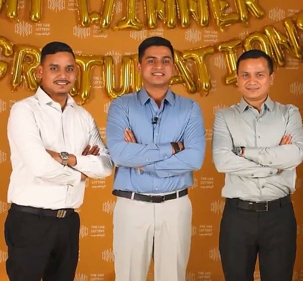 Tayab Khan (centre) with two of his friends who also won Dh6 million each