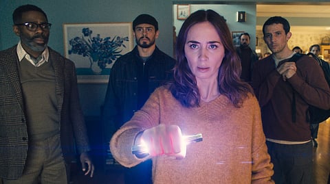 This image released by Universal Pictures shows Colman Domingo, from left, Tommy Martinez, Emily Blunt and Josh O'Connor in a scene from "Disclosure Day." 