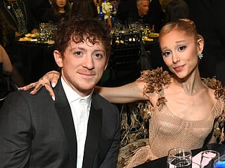 Ethan Slater, Ariana Grande and a guest attend FIJI Water at The 30th Critics Choice Awards at Barker Hangar on February 07, 2025 in Santa Monica, California.