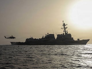 An MH-60R Sea Hawk, assigned to Helicopter Maritime Strike Squadron (HSM) 50, taking off of the flight deck of Arleigh Burke-class guided-missile destroyer USS Thomas Hudner during flight deck operations.