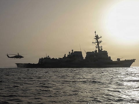 An MH-60R Sea Hawk, assigned to Helicopter Maritime Strike Squadron (HSM) 50, taking off of the flight deck of Arleigh Burke-class guided-missile destroyer USS Thomas Hudner during flight deck operations.