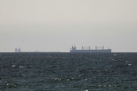 A bulk cargo ship sits at anchor in the Strait of Hormuz off Bandar Abbas, Iran. File photo taken on  May 2, 2026. 