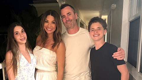 Marc Pinizotto, 43 (second from right), with his family